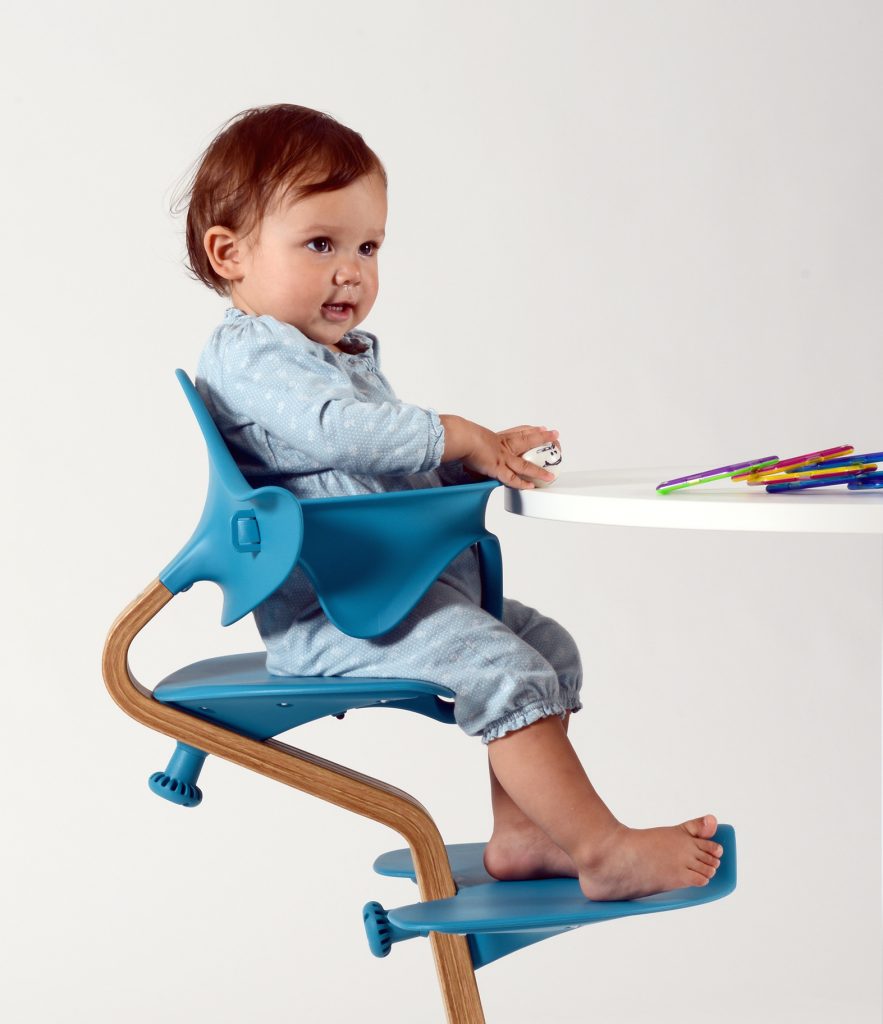 baby-sitting-in-nomi-high-chair-by__peter_opsvik-in blue